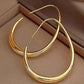 Gold Tone Teardrop Hoop Earrings - Reed House of Jewels