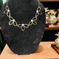3 Leaf Floral Crystal and Gold Tone Paperclip Necklace - Reed House of Jewels