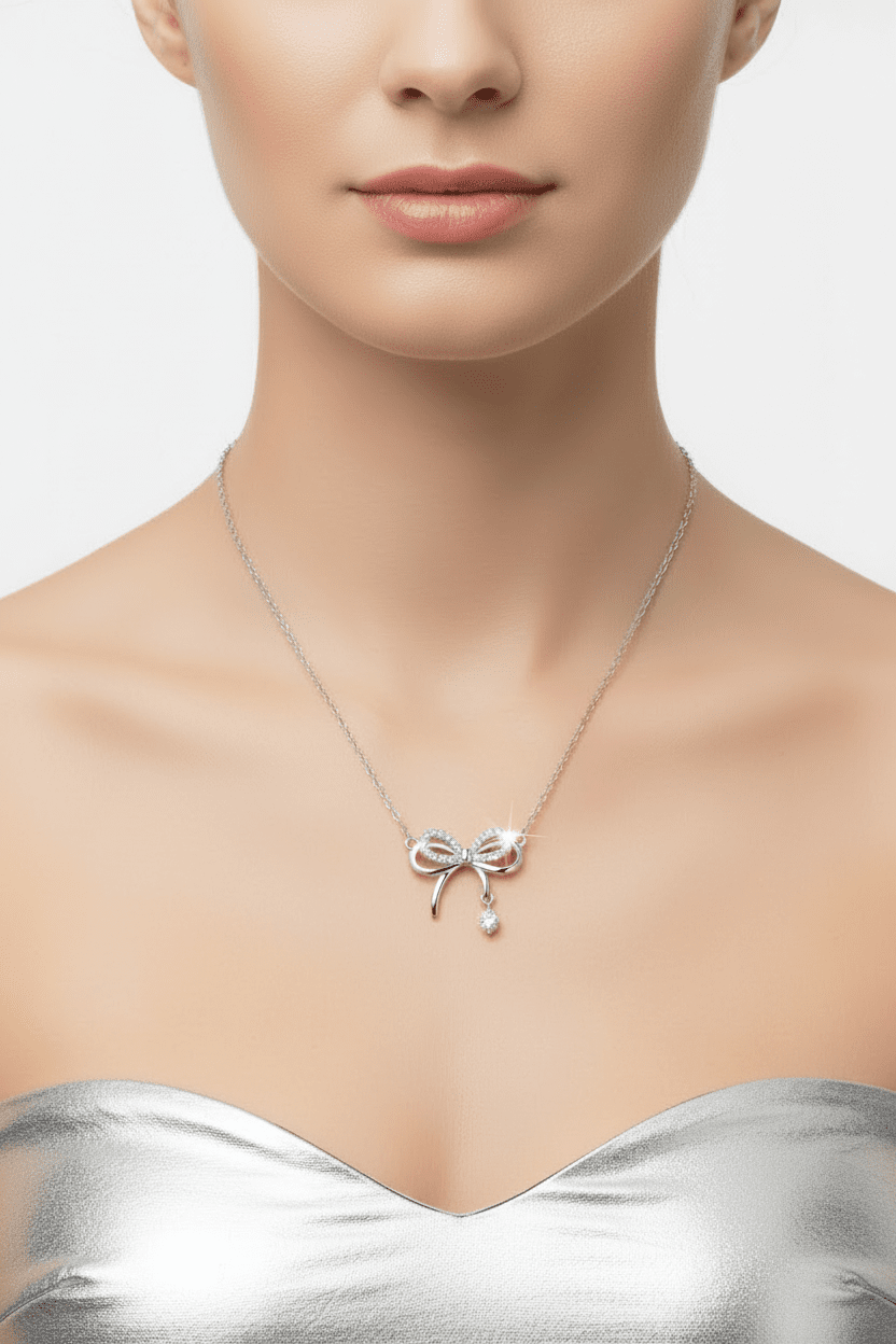 Silver Tone Bow Fixed Pendant Necklace - Reed House of Jewels