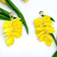 Yellow and Gold Tone Dangle Flower Earrings - Reed House of Jewels