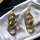 Swirl Drop Gold Tone Earrings - Reed House of Jewels