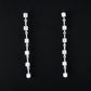 Silver Tone and Cubic Zirconia Dangle Earrings - Reed House of Jewels