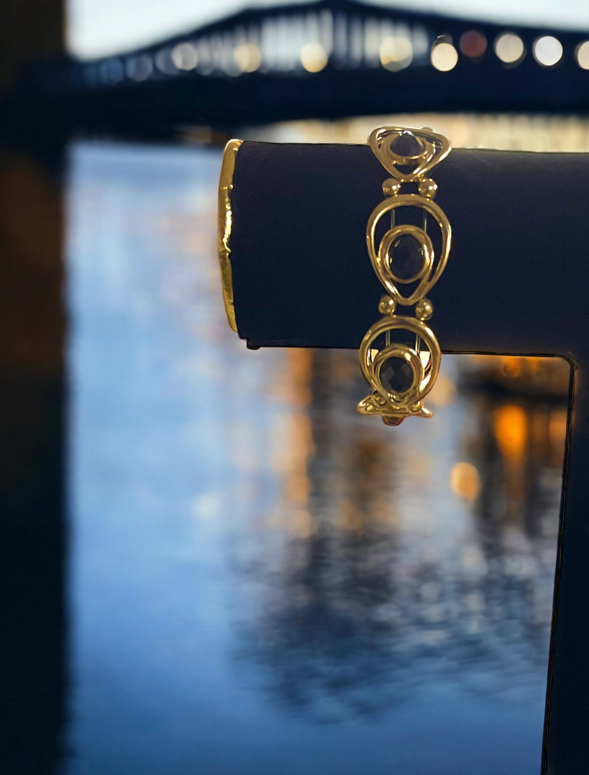 Gold Tone Open Disc with Jet Stone Accents Bracelet - Reed House of Jewels