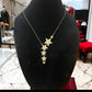 Gold and Crystal Shooting Stars Necklace - Reed House of Jewels