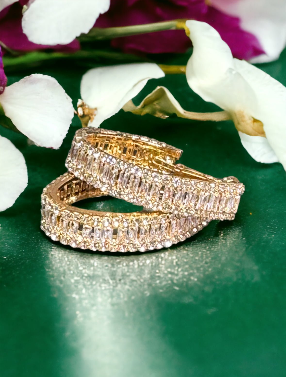 Cubic Zirconia and Gold Tone Oval Hoop Earrings - Reed House of Jewels
