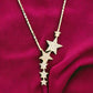 Gold and Crystal Shooting Stars Necklace - Reed House of Jewels