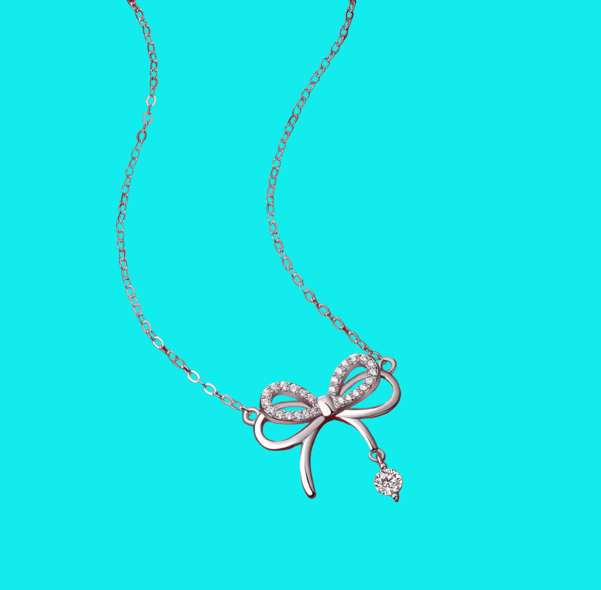 Silver Tone Bow Fixed Pendant Necklace - Reed House of Jewels