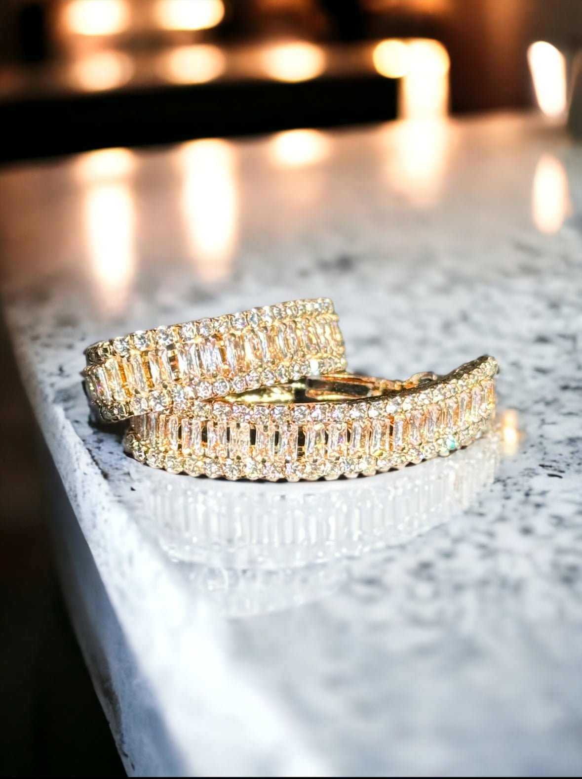 Cubic Zirconia and Gold Tone Oval Hoop Earrings - Reed House of Jewels