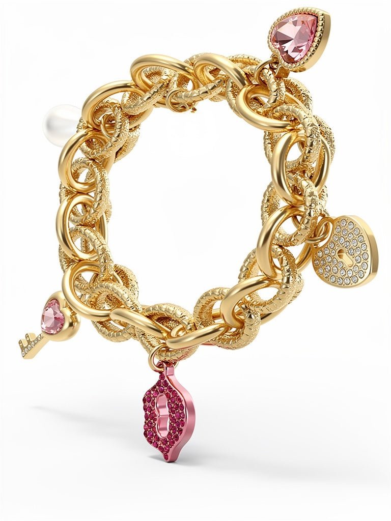Gold Tone and Pink Charm Bracelet - Reed House of Jewels