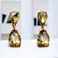 Gold Tone and Light Topaz Crystal Double Teardrop Post Earrings - Reed House of Jewels