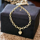 Chunky Gold Tone and Cubic Zirconia Heart Necklace - Reed House of Jewels