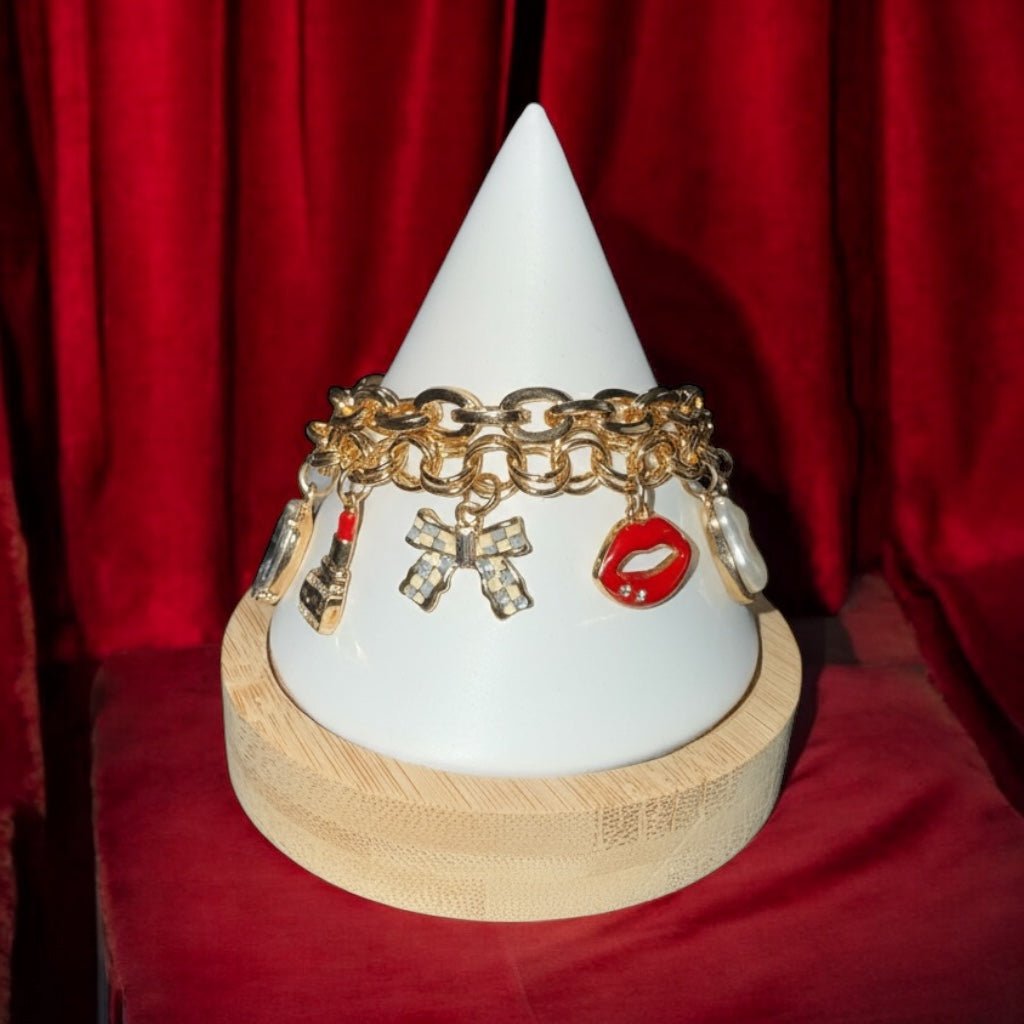 Gold Tone, Faux Pearl, Crystal, and Red Charm Bracelet - Reed House of Jewels