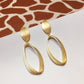 Gold Tone Rugby Clip - on Earrings - Reed House of Jewels