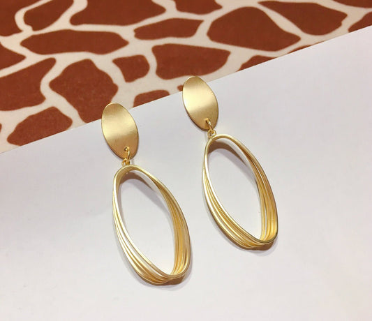 Gold Tone Rugby Clip - on Earrings - Reed House of Jewels