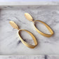 Gold Tone Rugby Clip - on Earrings - Reed House of Jewels