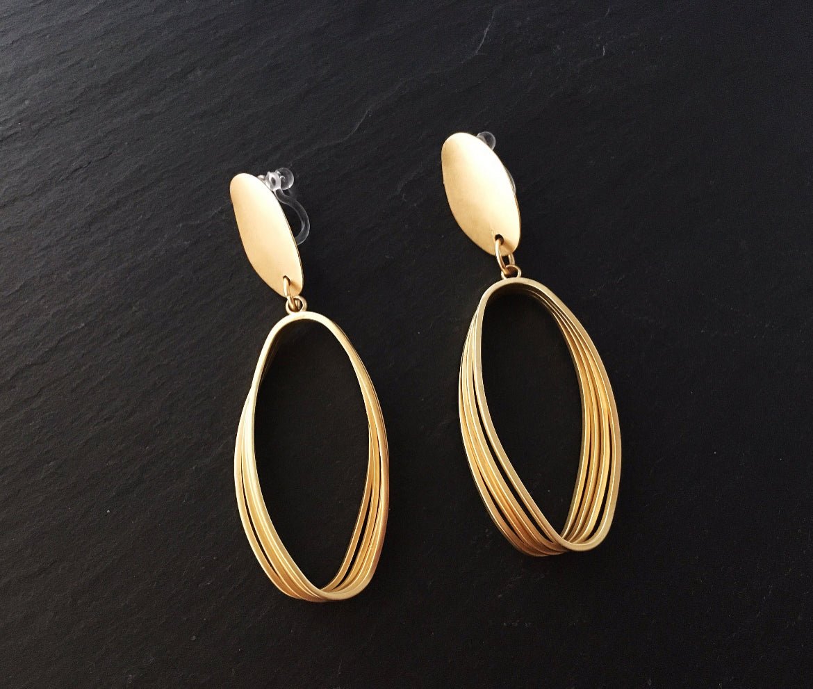 Gold Tone Rugby Clip - on Earrings - Reed House of Jewels