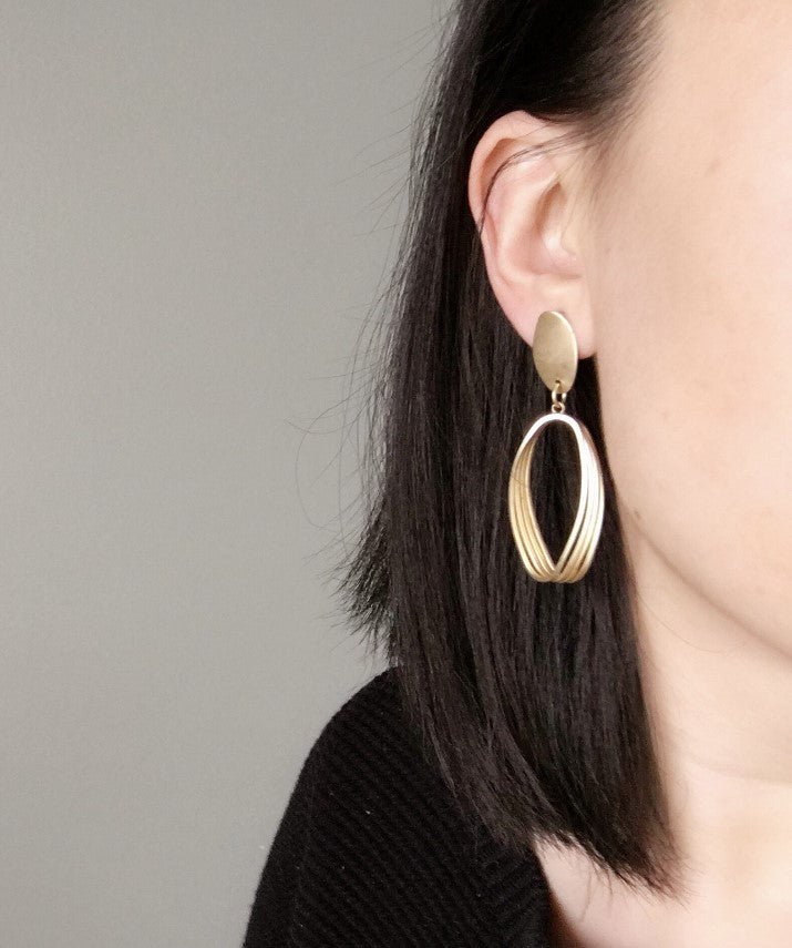 Gold Tone Rugby Clip - on Earrings - Reed House of Jewels