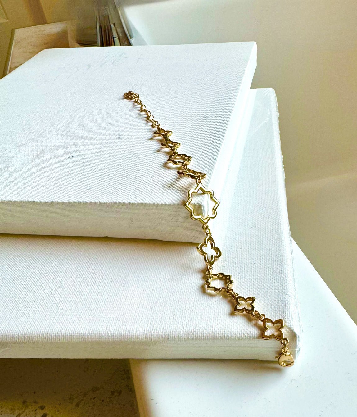 Gold Tone Motif Bracelet - Reed House of Jewels