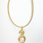 Gold Tone Wrapped Necklace with Gold and Faux Pearl Pendant - Reed House of Jewels