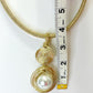 Gold Tone Wrapped Necklace with Gold and Faux Pearl Pendant - Reed House of Jewels