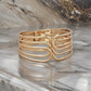 Gold Tone Multi Hinge Bangle Bracelet - Reed House of Jewels