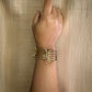 Gold Tone Multi Hinge Bangle Bracelet - Reed House of Jewels