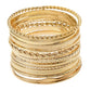 Gold Tone Textured Metal Bangle Stack - Reed House of Jewels