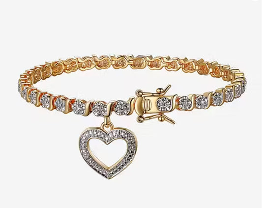 Gold and Diamond Accent 7.25 Inch Heart Charm Tennis Bracelet - Reed House of Jewels