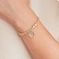 Gold and Diamond Accent 7.25 Inch Heart Charm Tennis Bracelet - Reed House of Jewels