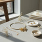 Matte Gold Metal Sunburst Flower Necklace - Reed House of Jewels