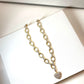 Chunky Gold Tone and Cubic Zirconia Heart Necklace - Reed House of Jewels